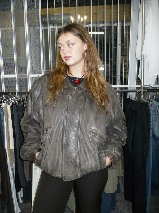 L - Bellissimo 1980s Faded Leather Bomber Jacket